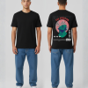 Zwart T-shirt met groen Grieks standbeeld hoofd, rood-witte stralende strepen, THE CREATION tekst, barcode en PARENTAL ADVISORY sticker op de rug
