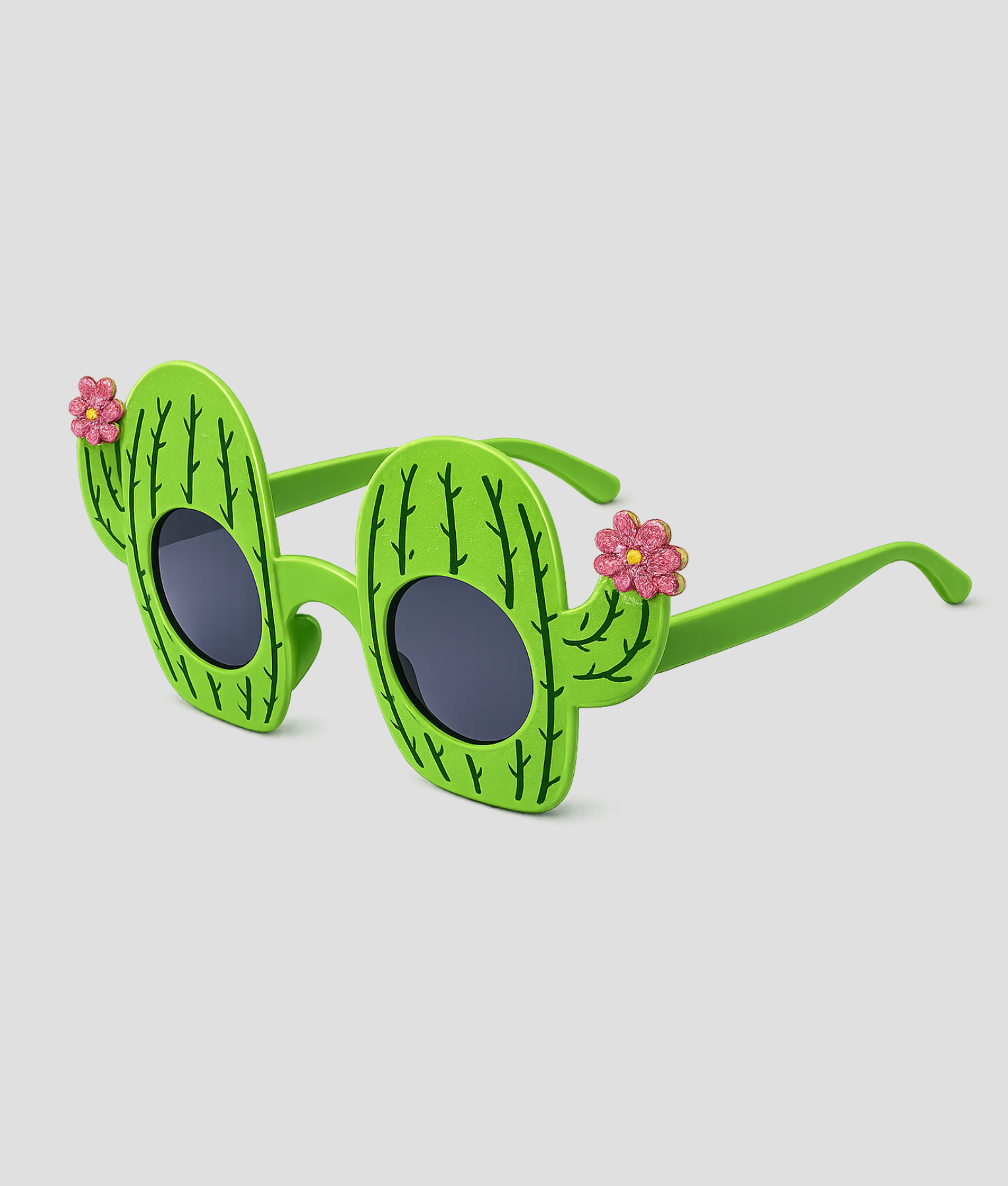 Groene zonnebril in de vorm van een cactus met roze bloemetjes