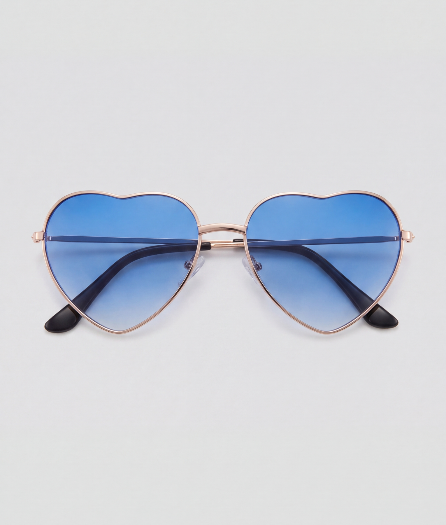 Blue heart, bril met goud montuur en blauw glazen