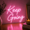 Keep Going roze neon lamp, de tekst Keep Going in roze