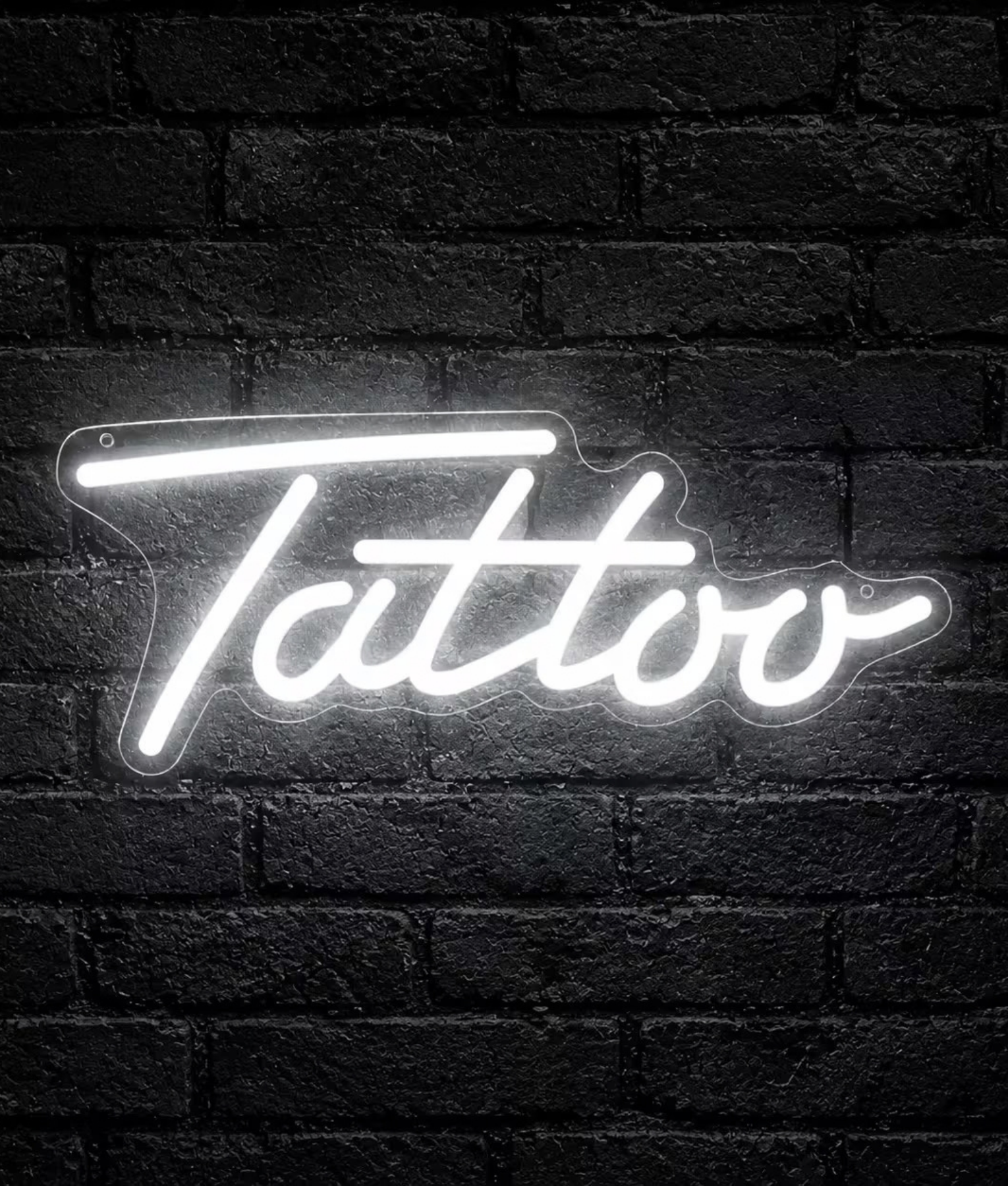 Tattoo wit neon lamp, het woord Tattoo in wit