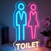 Toilet neon lamp, een toiletbordje met een man en een vrouw in blauw, roze en wit, sfeerfoto
