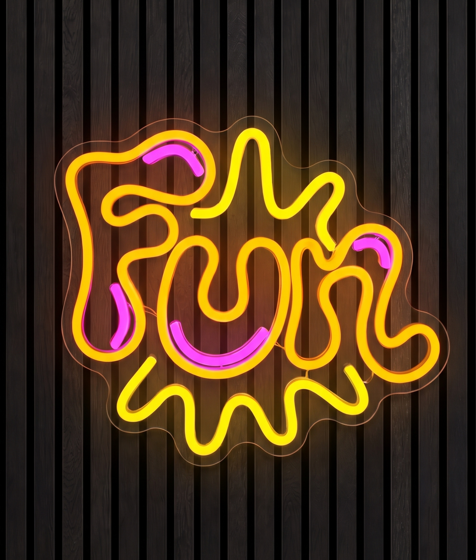 Fun neon lamp met het woord Fun in geel licht met roze accenten