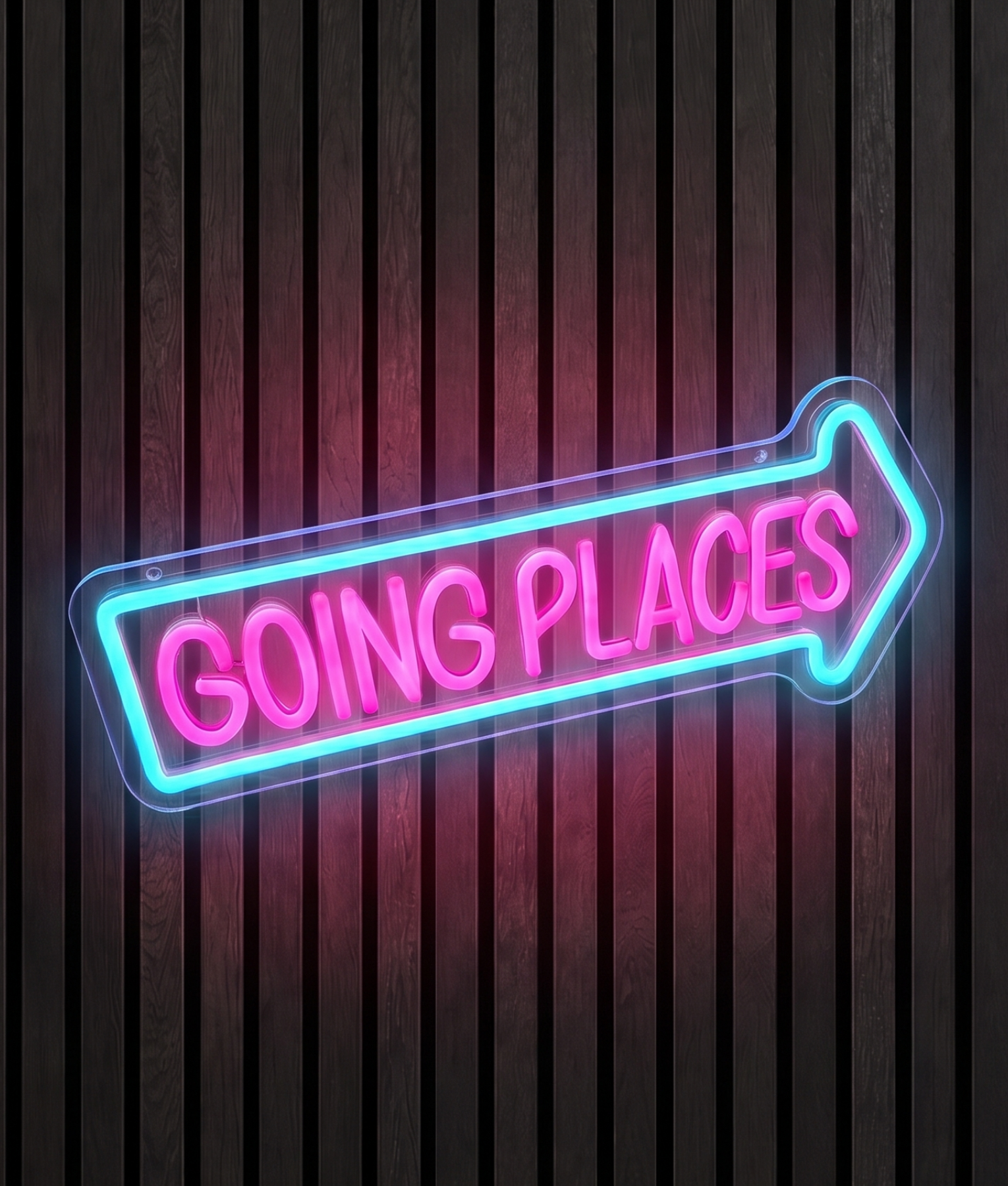 Going places neon lamp met de tekst Going places met een pijl in blauw en roze licht