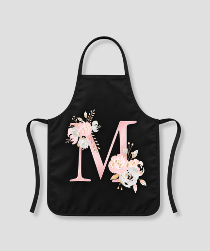 Letter M schort: zwart keukenschort met roze letter M en bloemen